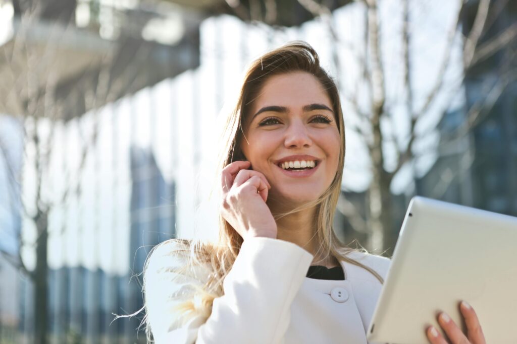 SWL Care Haven female staff member providing exceptional customer support over the phone, assisting a client who contacted the organisation through the website's contact page for help and enquiries