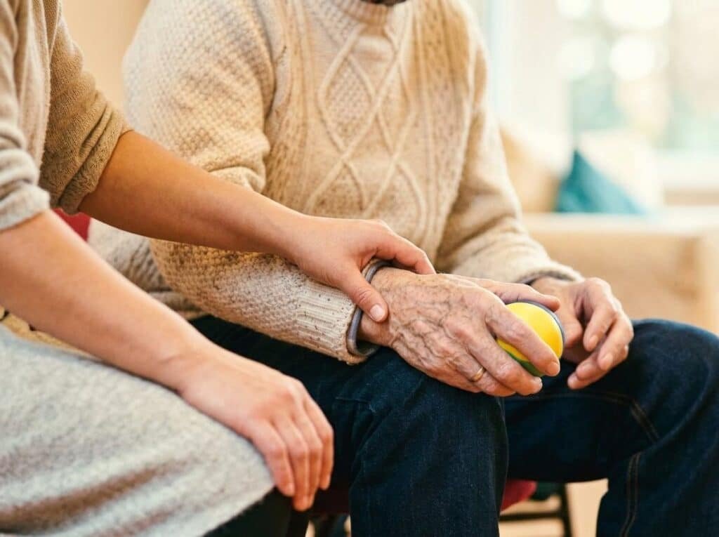 Compassionate caregiver supporting an elderly person with home care in Croydon, London.